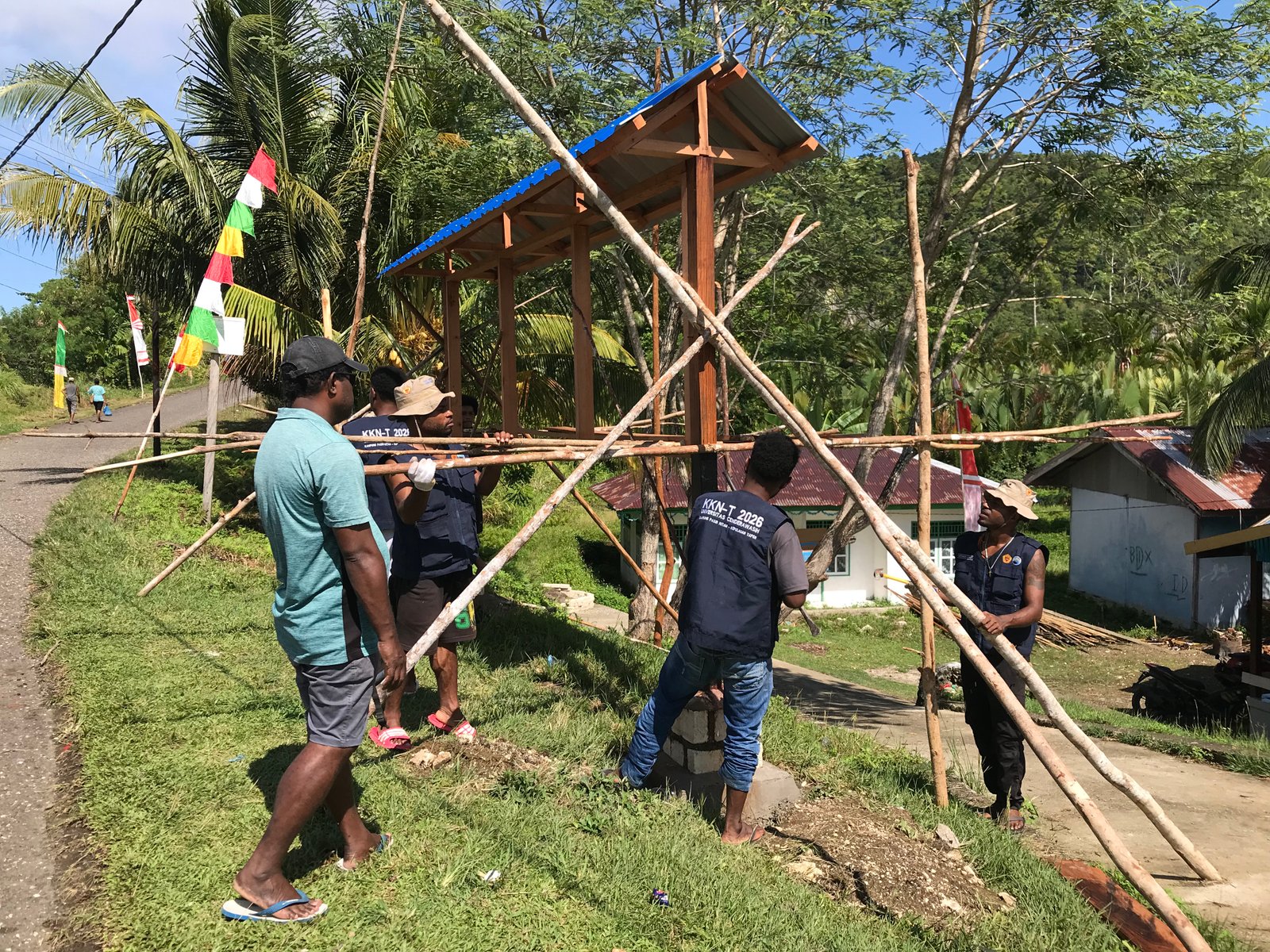 Pembuatan Papan Balai Kampung